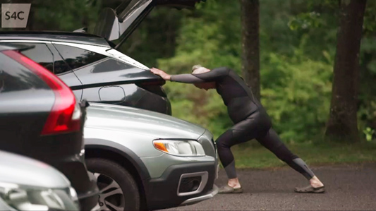 Gareth uses his Hyundai to stretch before a swim
